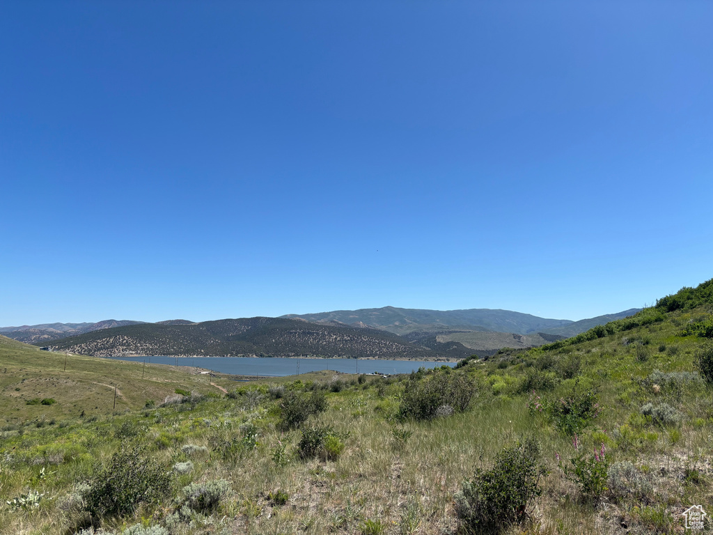View of mountain backdrop with a large body of water