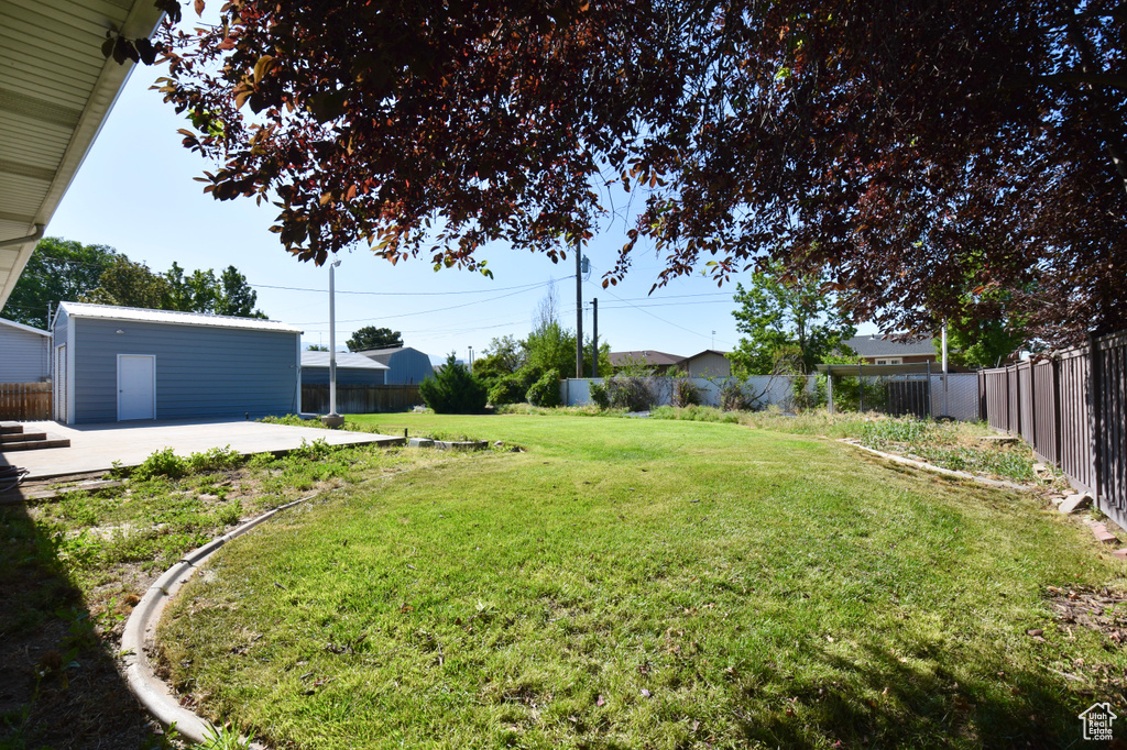 Fenced backyard featuring a patio area