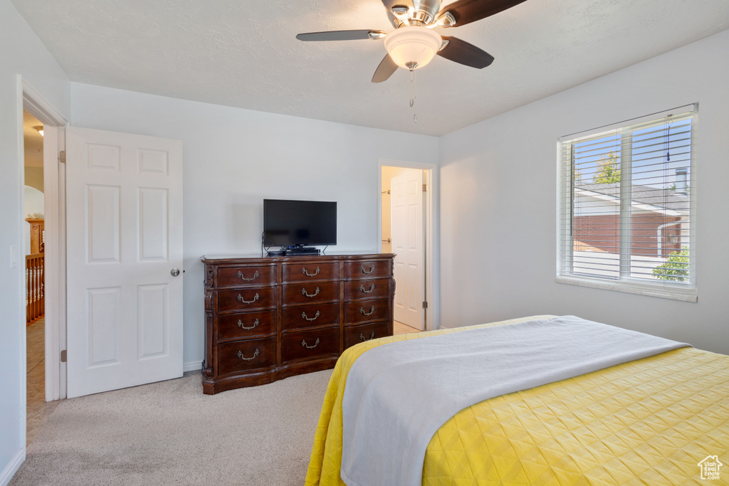 Bedroom with carpet floors and ceiling fan