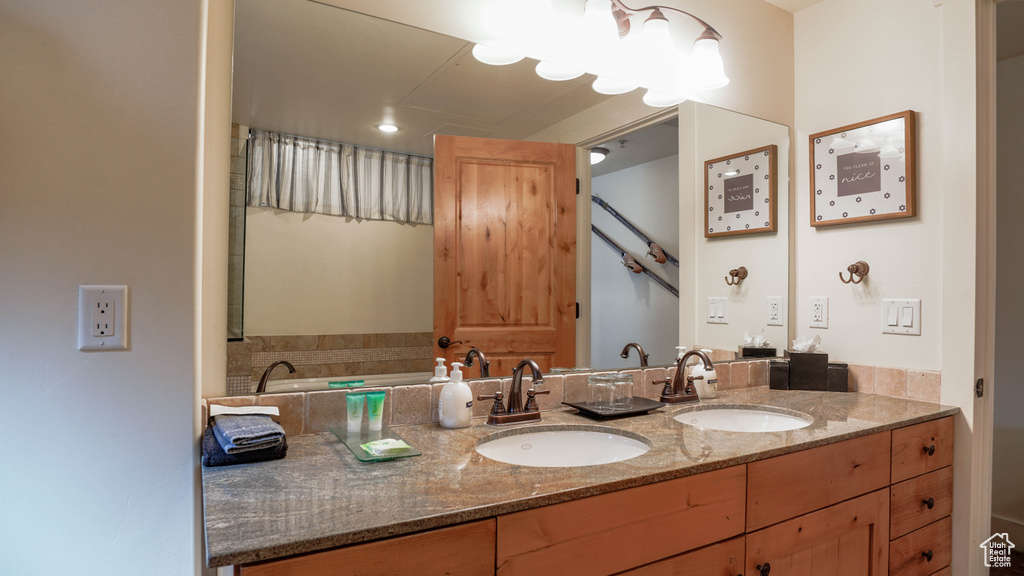 Full bathroom with double vanity