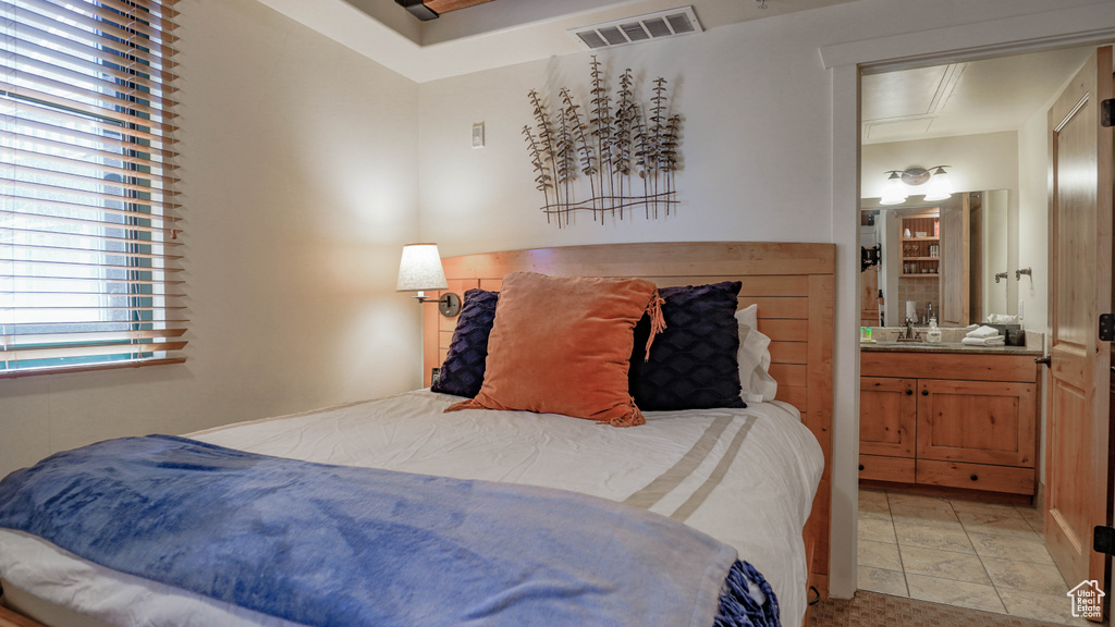Bedroom with connected bathroom