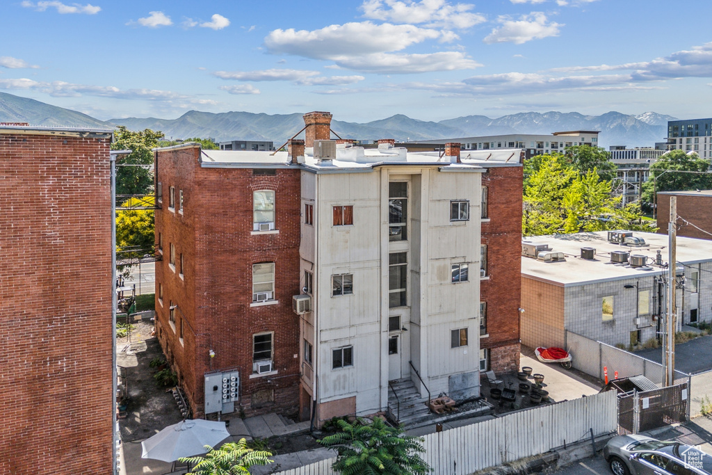 View of apartment building / complex with a mountain view