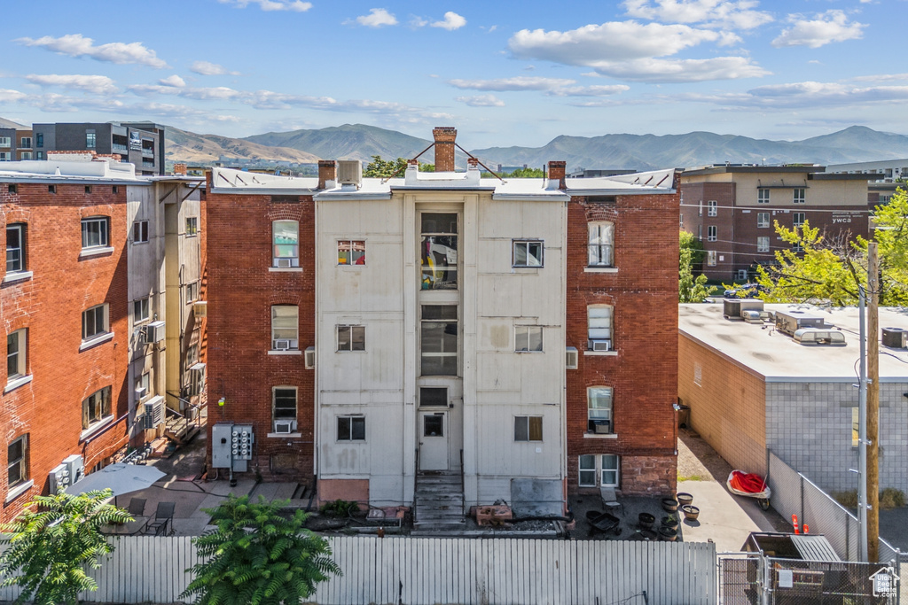 View of apartment building / complex with a mountain view