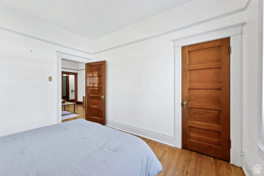 Bedroom featuring wood finished floors