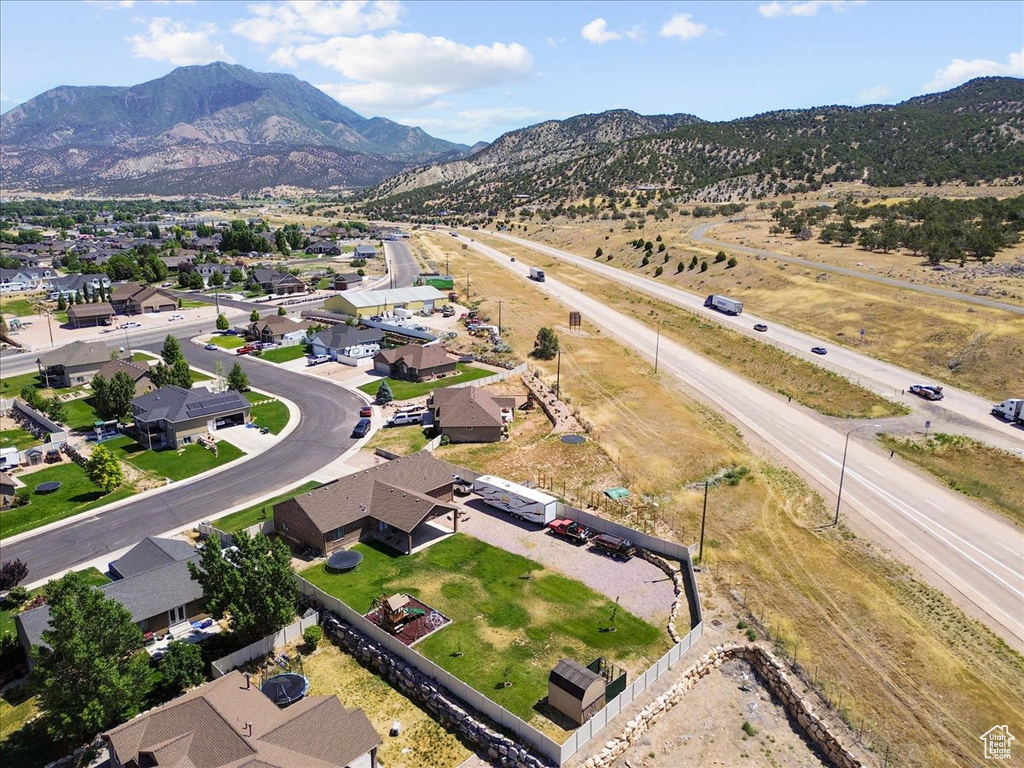 Aerial overview of property's location with nearby suburban area