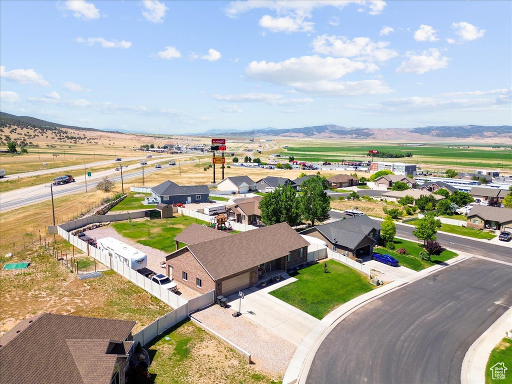 Aerial view of residential area with mountains