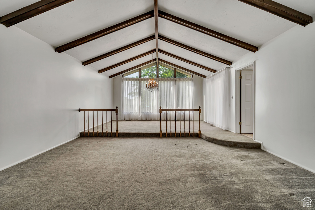 Empty room with carpet flooring