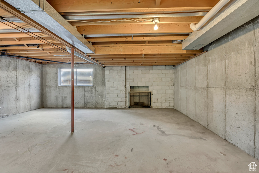Below grade area with a fireplace