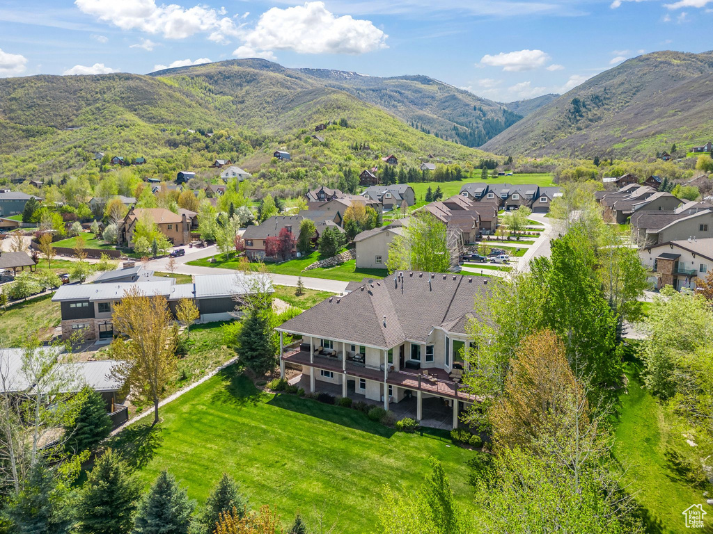 Aerial view of residential area with mountains