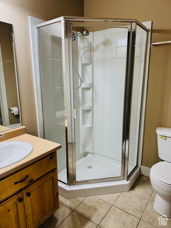 Full bath featuring vanity and a stall shower