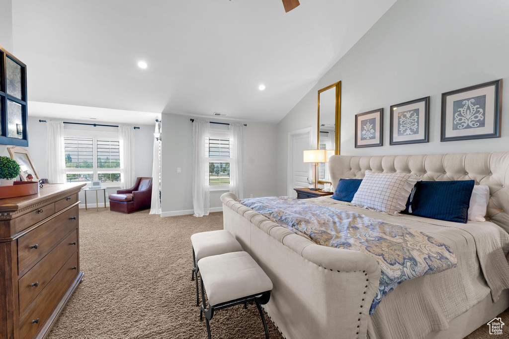 Bedroom featuring light carpet, recessed lighting, and vaulted ceiling