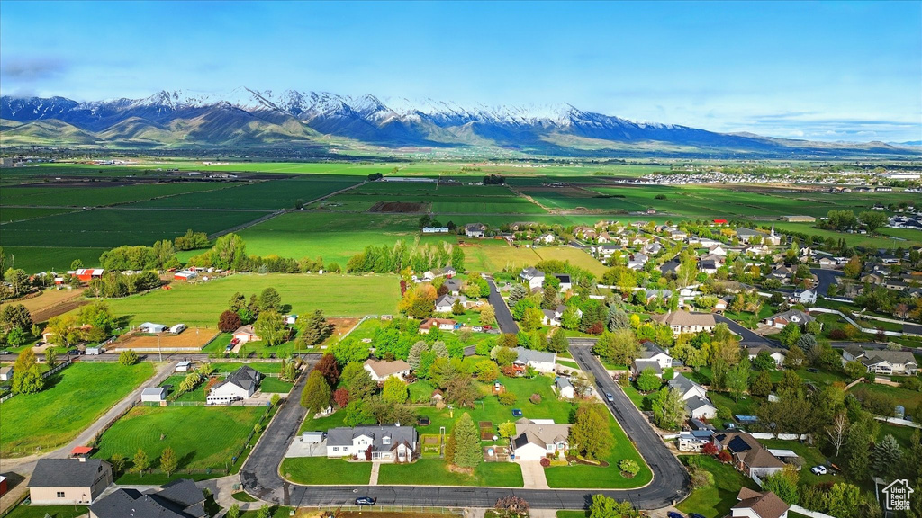 Aerial view of residential area with a mountainous background