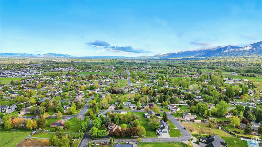 Aerial view of residential area with a mountainous background