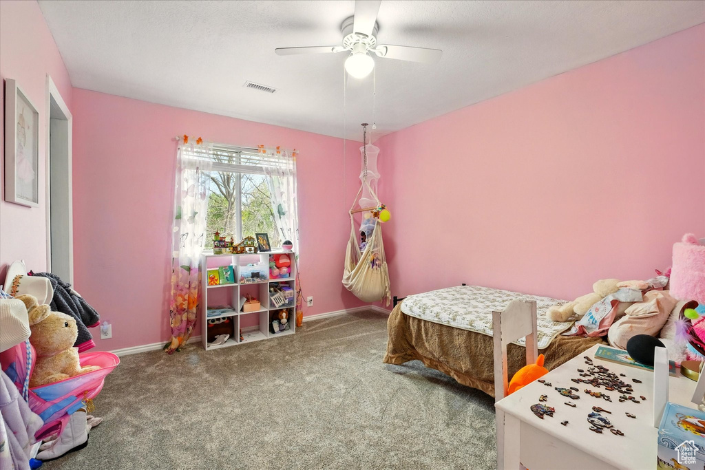 Bedroom with carpet floors and ceiling fan