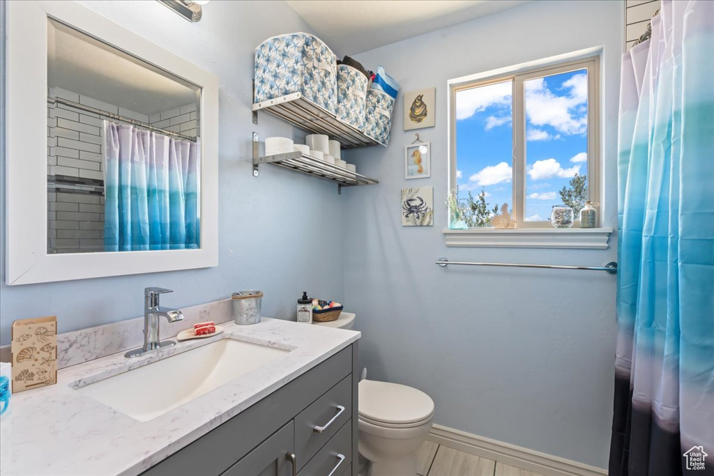 Bathroom with vanity and a shower with curtain