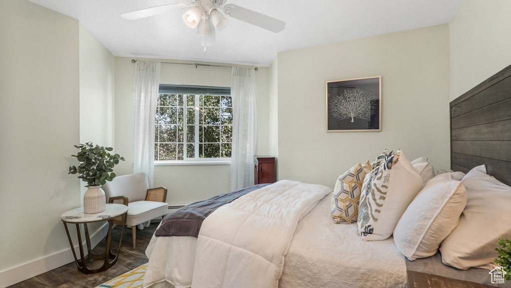 Bedroom with baseboards and a ceiling fan