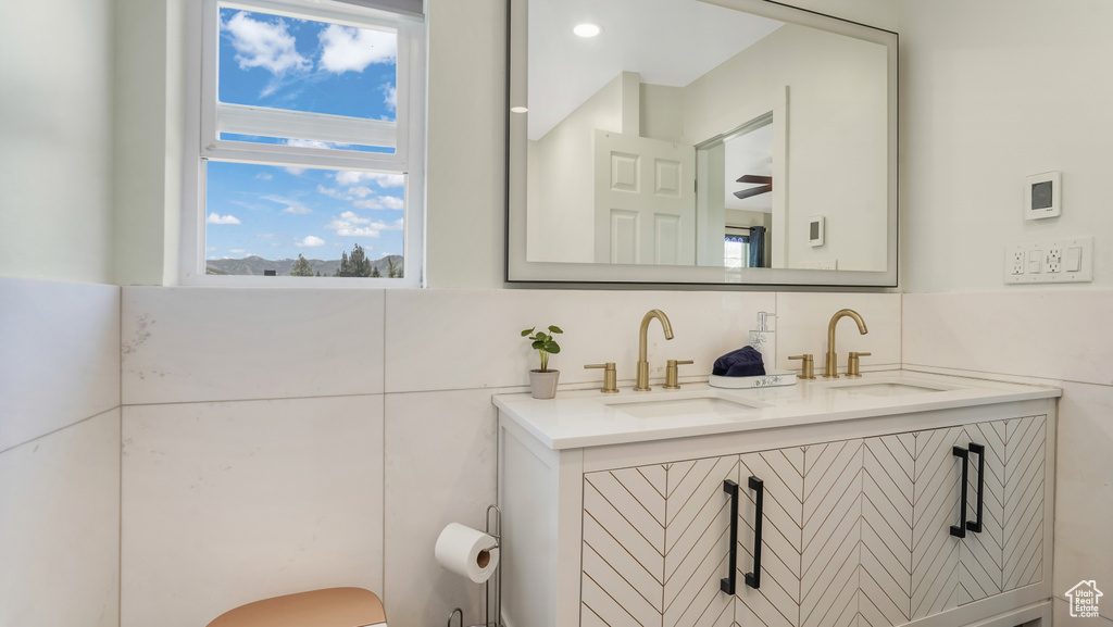 Bathroom featuring double vanity