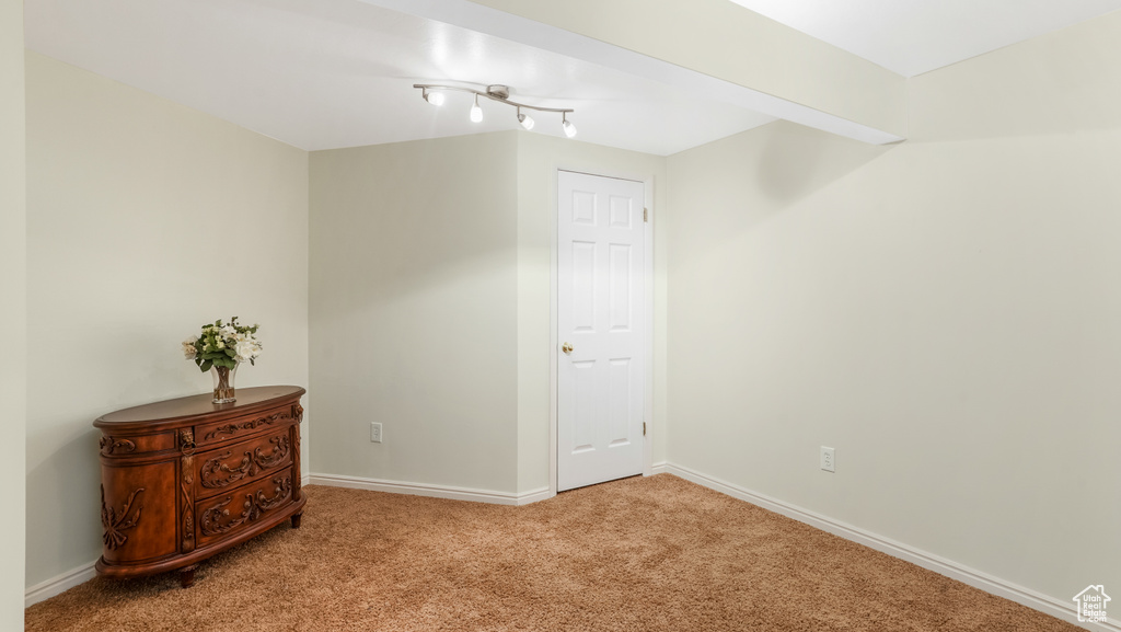 Bedroom with carpet and baseboards