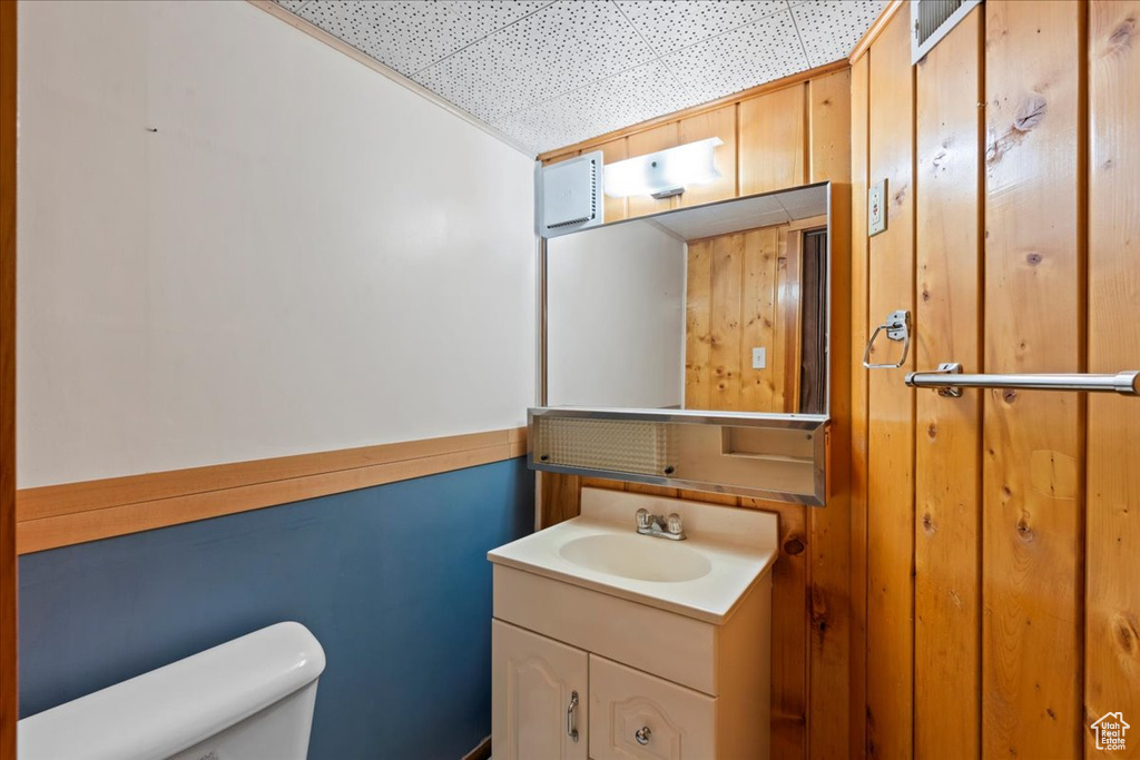 Half bath with toilet and vanity