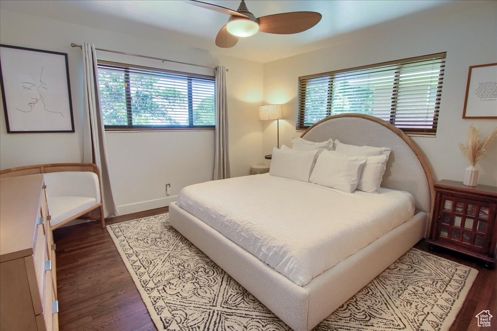 Bedroom featuring wood finished floors and ceiling fan