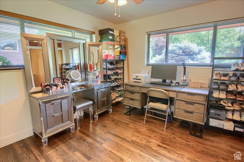 Office with a ceiling fan and wood finished floors