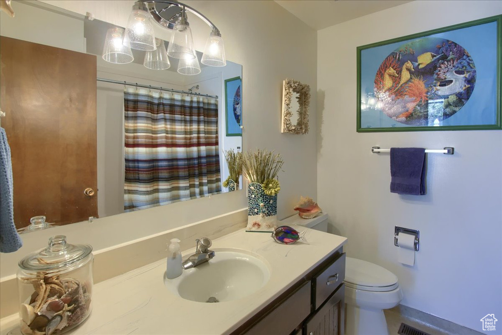 Bathroom with vanity and a shower with curtain
