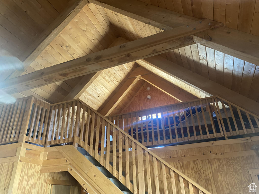 Staircase with wooden ceiling