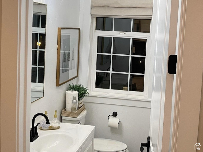 Bathroom featuring toilet and vanity