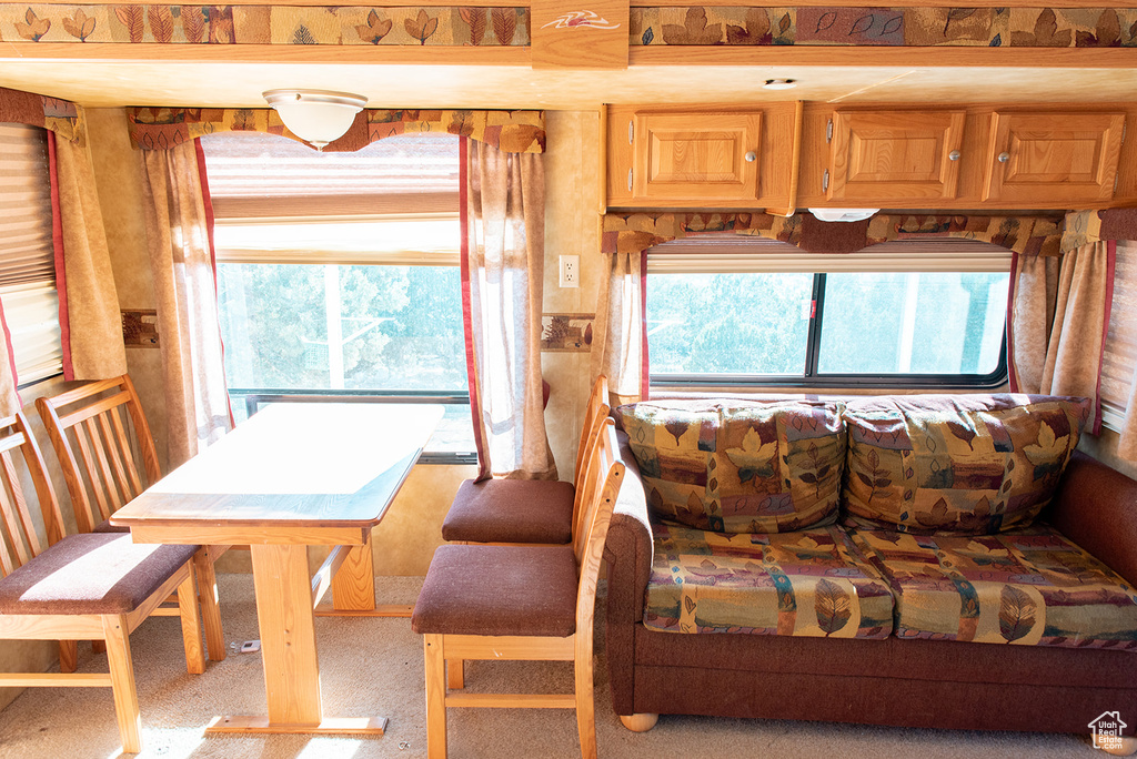 View of carpeted dining space