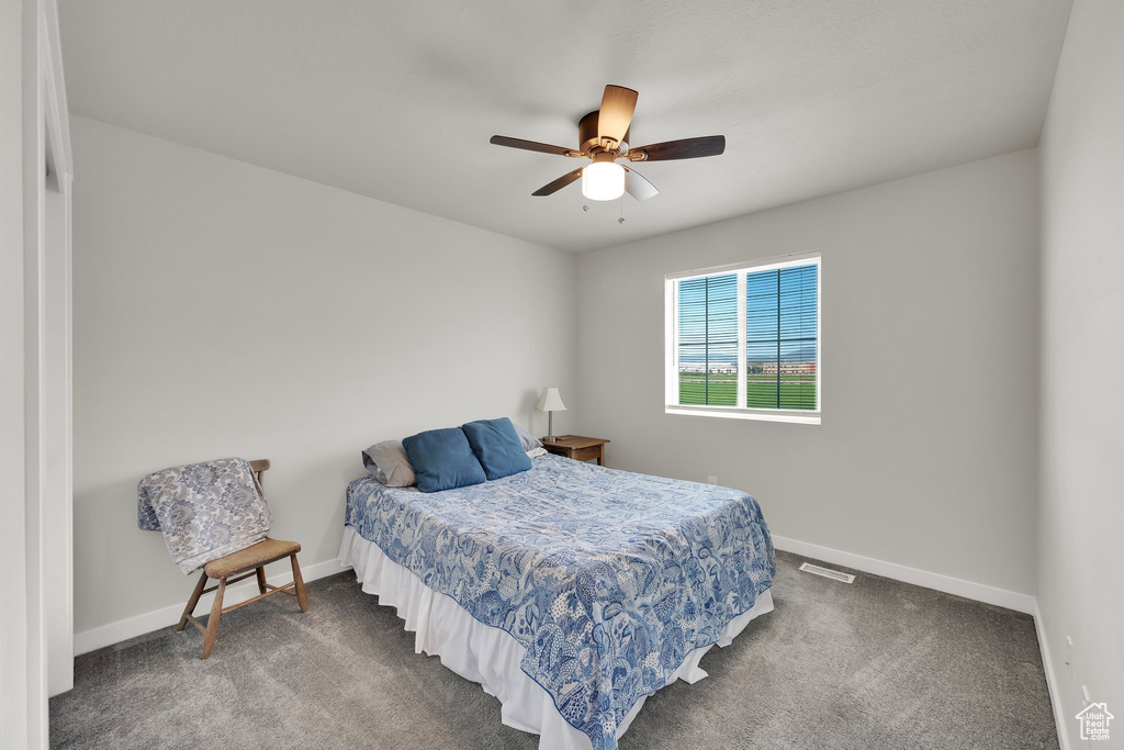 Bedroom with carpet floors and ceiling fan