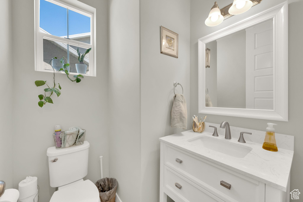Half bath with toilet and vanity