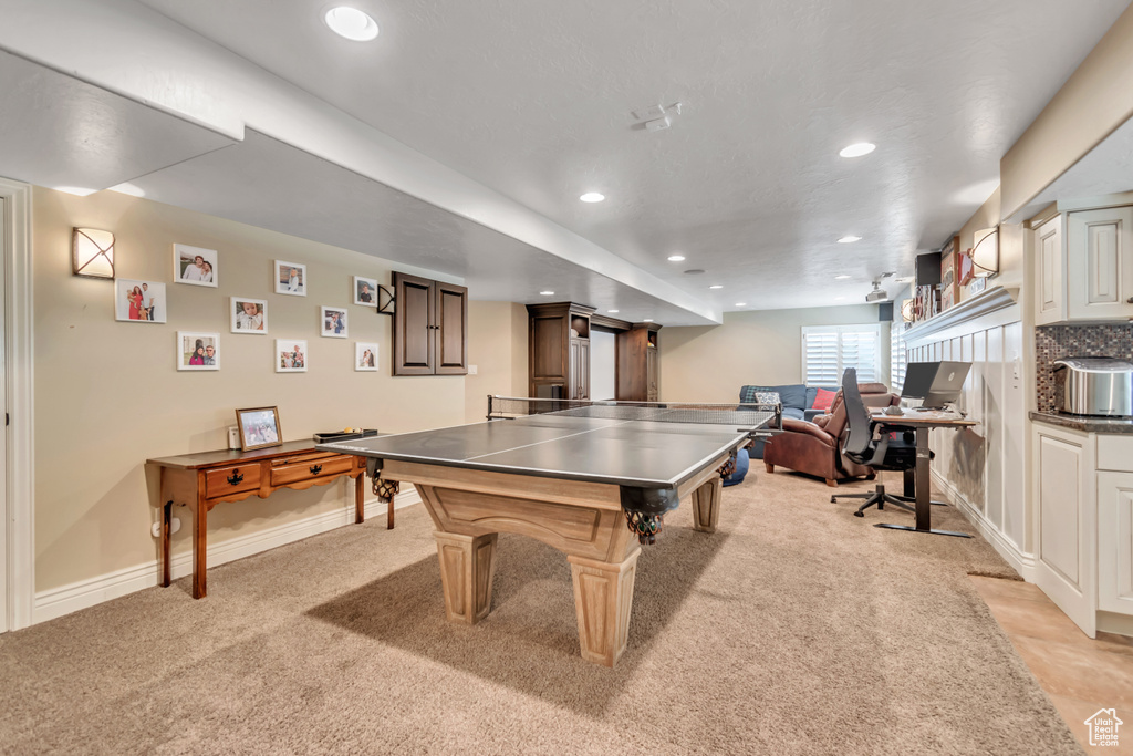 Playroom featuring recessed lighting, light colored carpet, and an office area