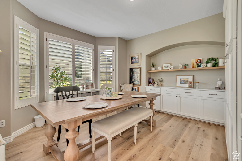 Dining space with light wood finished floors