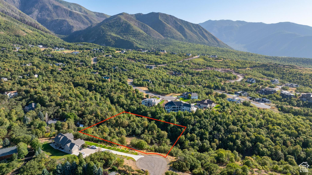 Birds eye view of property featuring a mountain view