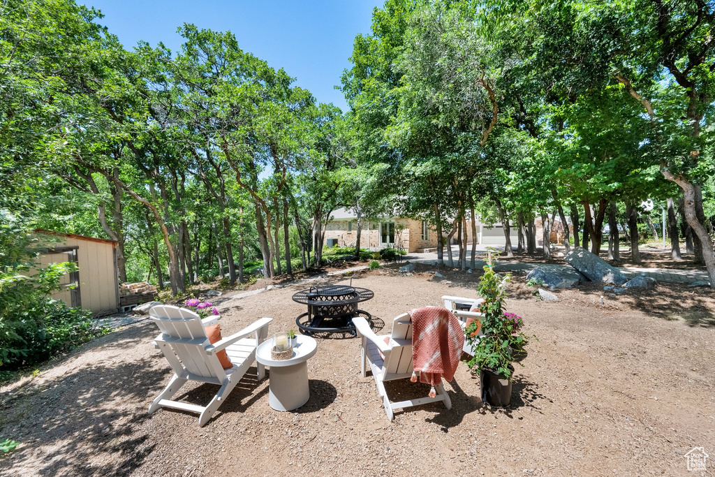 View of yard featuring a fire pit