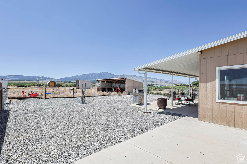 View of patio with a mountain view