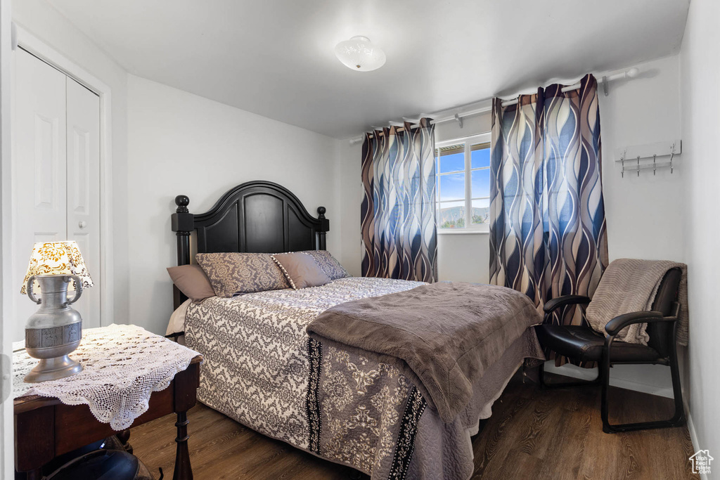 Bedroom with wood finished floors