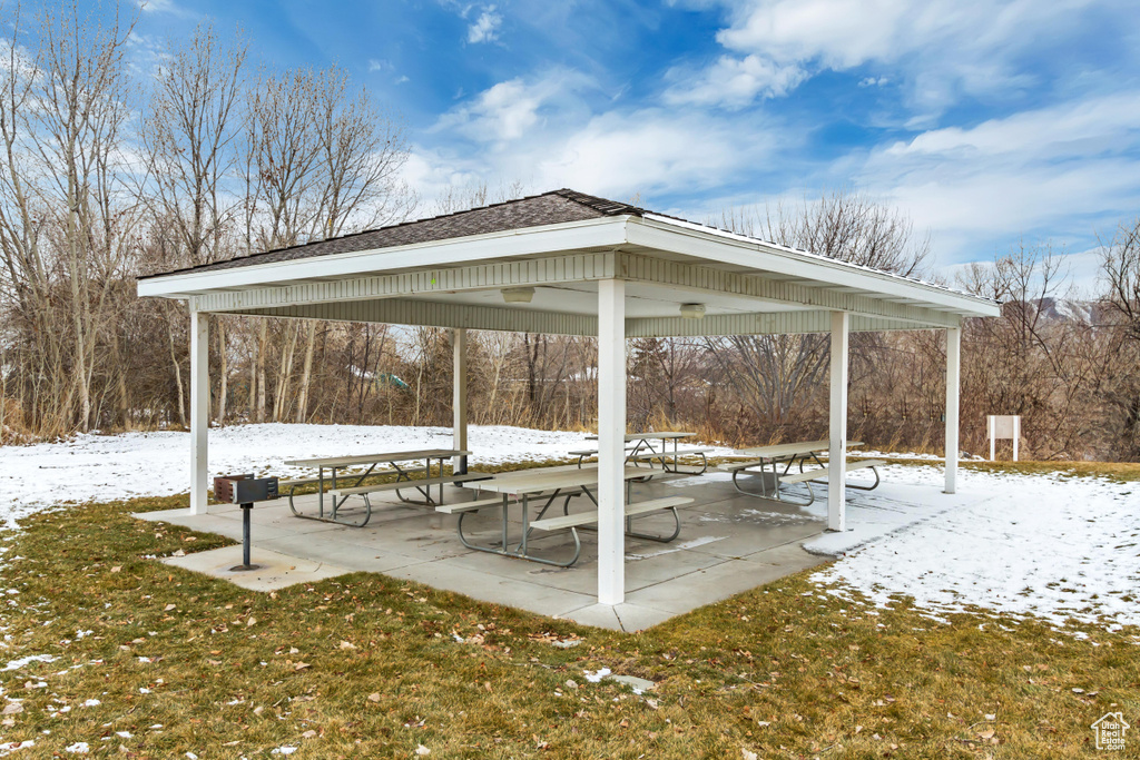 View of community featuring a gazebo, a patio area, and a lawn