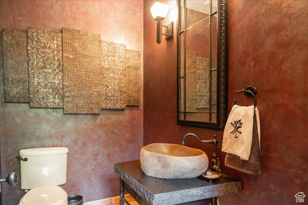 Bathroom with toilet and vanity