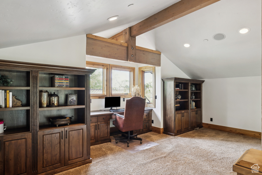 Office space with vaulted ceiling, light colored carpet, and recessed lighting
