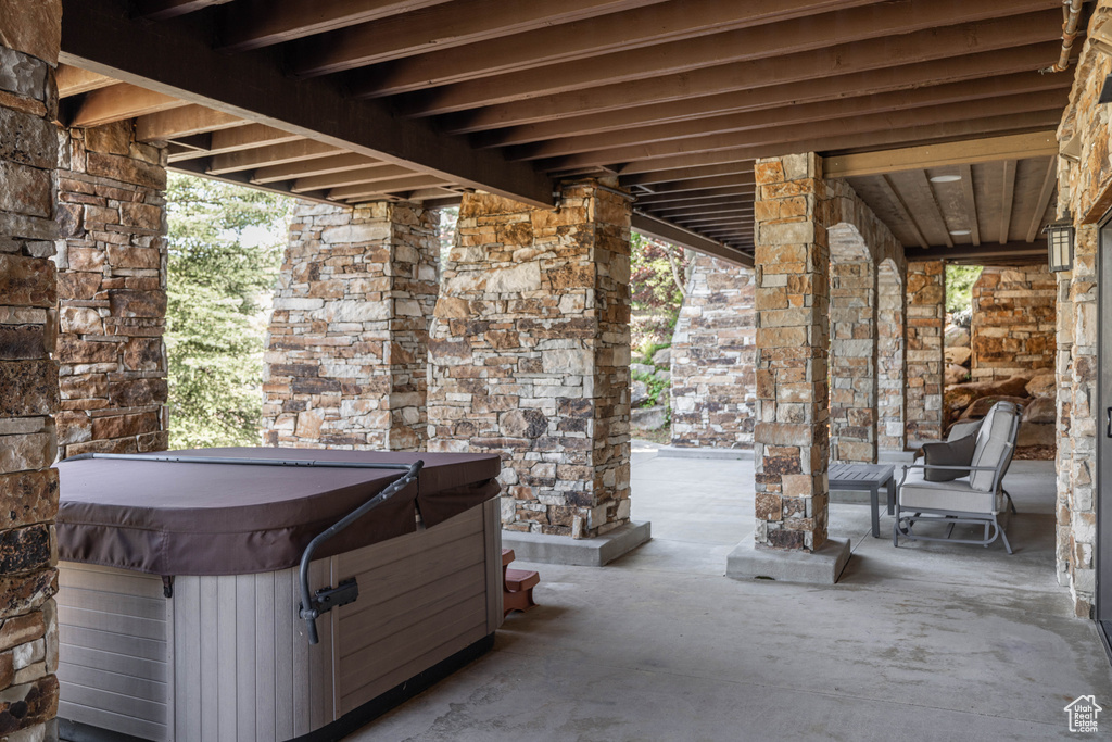 View of patio / terrace featuring a hot tub