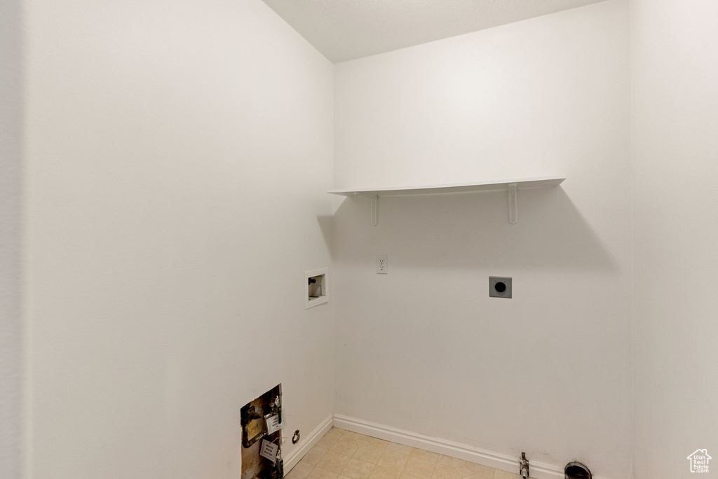 Laundry room featuring washer hookup and hookup for an electric dryer