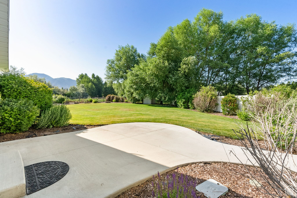 View of patio / terrace with a mountain view