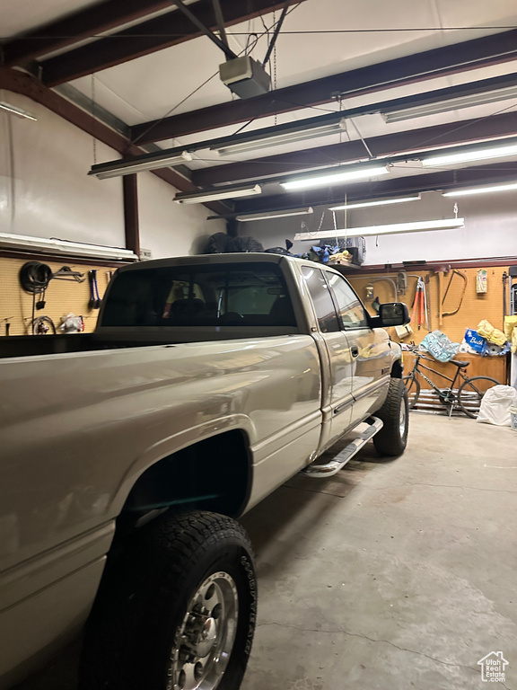 Garage featuring a garage door opener