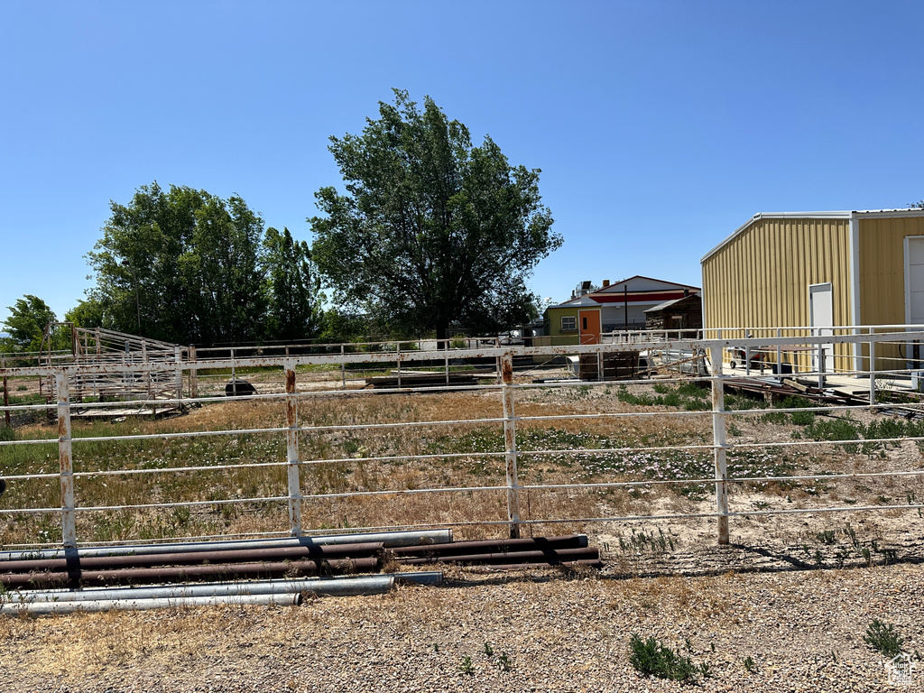 View of yard with an exterior structure