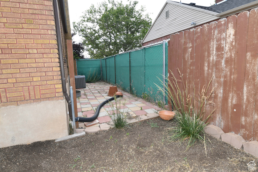 Fenced backyard featuring a patio area