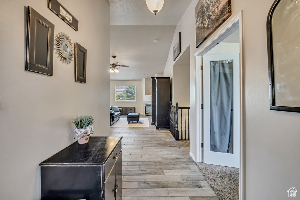 Hall featuring light wood-style floors