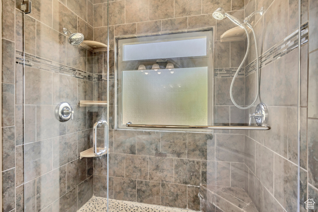 Full bath with a shower stall
