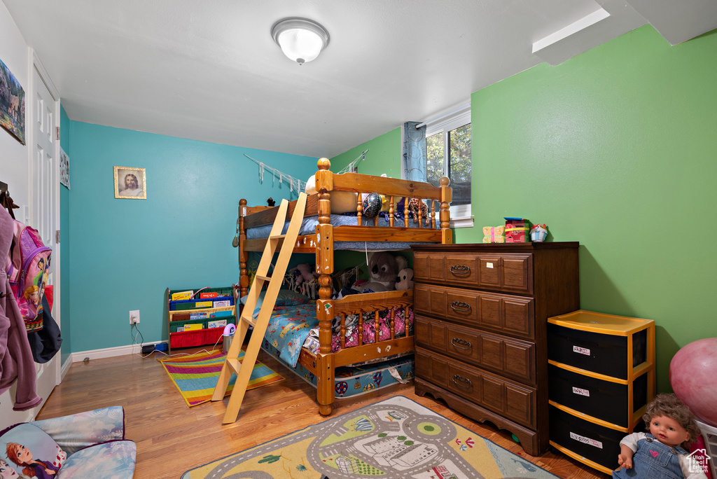 Bedroom featuring wood finished floors