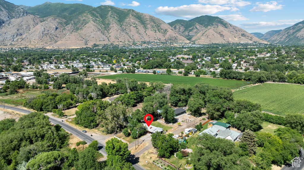 Aerial view of property\'s location featuring mountains